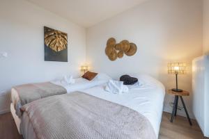 Postel nebo postele na pokoji v ubytování Nouveau - Sweet Garden - Maison avec jardin