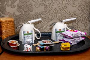 Facilități de preparat ceai și cafea la Agora' Boutique Self-Check In