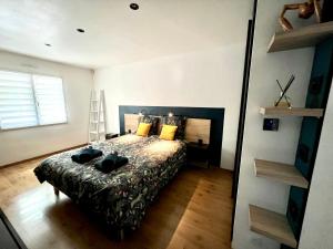 Кровать или кровати в номере Villa Cornouaille