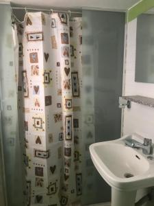 Ванная комната в Vila Floban & MIRDAR KOSHI