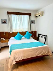 Postel nebo postele na pokoji v ubytování Hotel Concorde