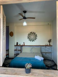 Cama ou camas em um quarto em Pousada do Tom