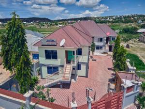 an overhead view of a house with a red roof at SULTANA APPARTMENTS in Mwanza