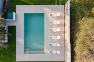 an overhead view of a swimming pool in a yard at Nature Retreat Skiathos Villa in Kolios +60 photos