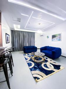 A seating area at Service apartment is Abuja