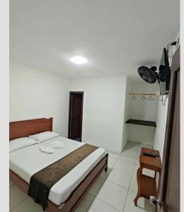 Katil atau katil-katil dalam bilik di La Posada Casa Hostal