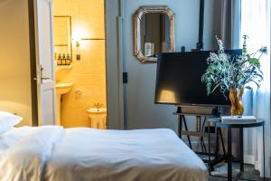 Voodi või voodid majutusasutuse Hotel Royal toas