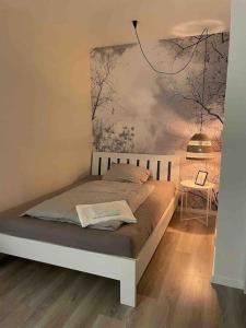 Säng eller sängar i ett rum på Modernes Apartment in unmittelbarer Uninähe
