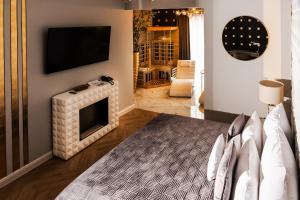 Telewizja i/lub zestaw kina domowego w obiekcie Hotel Luxor