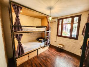 Postel nebo postele na pokoji v ubytování MedioMundo Hostel