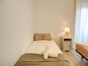 Posteľ alebo postele v izbe v ubytovaní Clarimar Duplex by Hello Homes Sitges