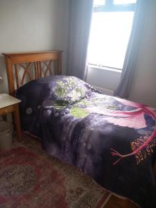 Voodi või voodid majutusasutuse Home Comforts toas