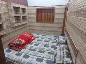 Krevet ili kreveti u jedinici u okviru objekta Annu Bhai sewa sadan