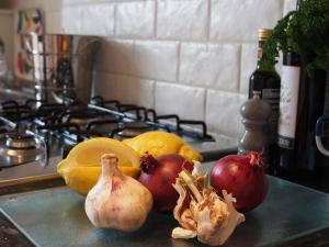 a group of fruits and vegetables on a kitchen counter at Stunning apartment in the centre of Corbridge in Corbridge