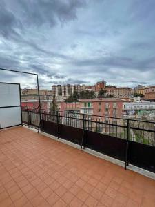 a balcony with a view of a city at Puzzle Rooms in Campobasso