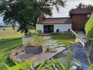 Zahrada ubytování Le Hameau - Villa de Luxe avec Piscine Intérieure & Jacuzzis