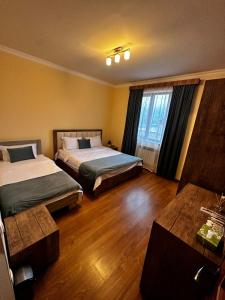 Ein Bett oder Betten in einem Zimmer der Unterkunft Zartonq