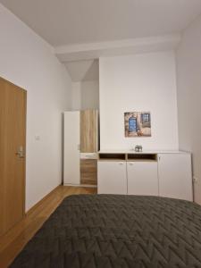 Rúm í herbergi á Apartment Lea