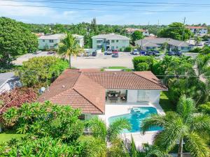 an aerial view of a house with a swimming pool at SoFlo Oasis 6 min to Beach Pool BBQ in Fort Lauderdale
