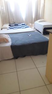 Cama o camas de una habitación en Hotel Itapuã Al Mare