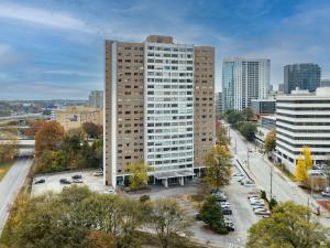 an aerial view of a tall building in a city at 21Floor-Renovated 2BR,1Bath King and Queen Bed and Parking in Atlanta