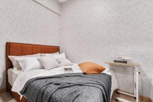 Black & Brown - Purity & Rusticity tesisinde bir odada yatak veya yataklar
