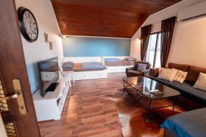 a living room with a couch and a table at Villa Ursula in Umag