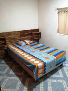 Postelja oz. postelje v sobi nastanitve Rest House Vista al Mar