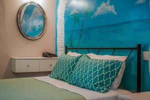 A bed or beds in a room at House Christina