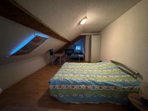 Ένα ή περισσότερα κρεβάτια σε δωμάτιο στο Appartement logis balnéen