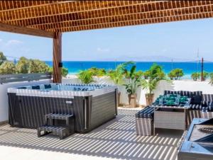 Gallery image of ODYSSEA Top View & Hot Jacuzzi Front Beach in Kremasti