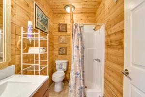 a bathroom with a toilet and a shower at Walk to Shore Freeport Beach House with Grill! in Freeport +29 photos