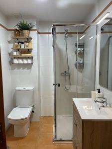 Koupelna v ubytování Apartamento en palmeira - Colores del Barbanza Naranja