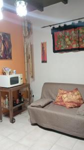 A seating area at Shanti Ca' casa indipendente con giardino