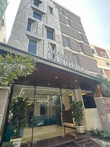 a building with a sign on the front of it at Hotel Landridge - HITECH City Hyderabad in Hyderabad
