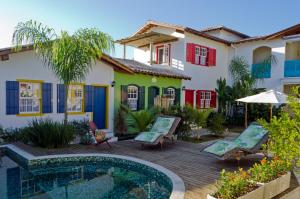 Bazén v ubytování Quinta Brasilis Boutique Hotel Paraty nebo v jeho okolí