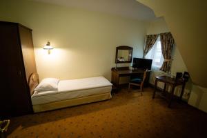 Postel nebo postele na pokoji v ubytování Hotel Górski
