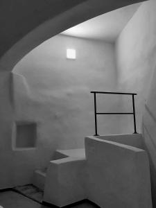 Telewizja i/lub zestaw kina domowego w obiekcie Casa Vacanze Arma delle Manie