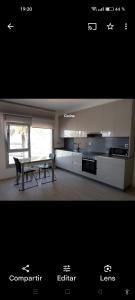 Kuchyň nebo kuchyňský kout v ubytování Vistas al mar en Corrubedo