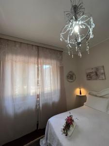 Postel nebo postele na pokoji v ubytování SALGE b&b RESIDENZA DI CHARME