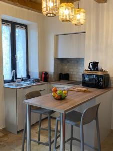 Kuchyň nebo kuchyňský kout v ubytování Très beau studio avec terrasse + 12 fotografií