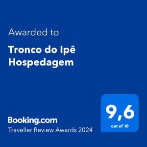 תעודה, פרס, שלט או מסמך אחר המוצג ב-Tronco do Ipê Hospedagem