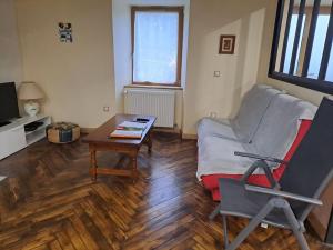 Posezení v ubytování Ferme auvergnate