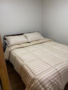 Una cama o camas en una habitación de Cabañas Varas