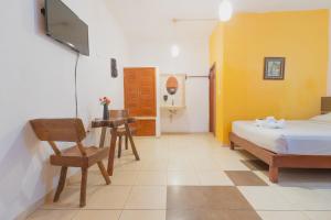 Postel nebo postele na pokoji v ubytování Hotel Szapot