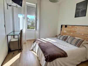 Postel nebo postele na pokoji v ubytování Atlantis Hôtel