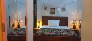 Katil atau katil-katil dalam bilik di Aivilo Home