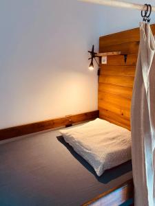 Кровать или кровати в номере Aldeia Caiçara Surf House