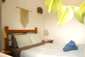 Кровать или кровати в номере Aldeia Caiçara Surf House