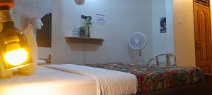 Katil atau katil-katil dalam bilik di Aivilo Home